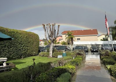 A double rainbow over the front entry to the Olive Vista facility